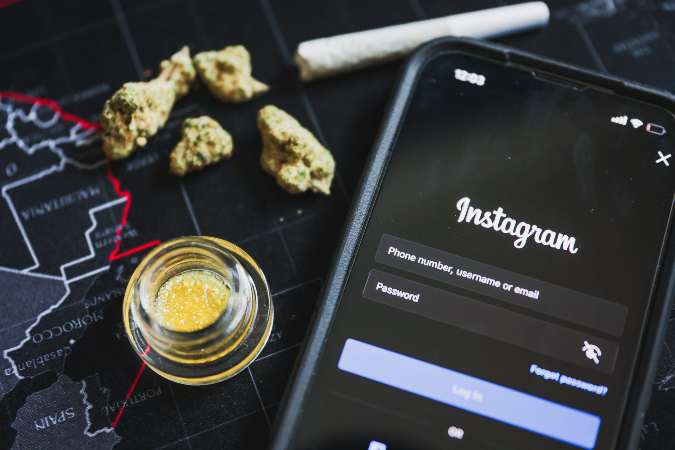 Cannabis marketing with instagram using phone and cannabis products